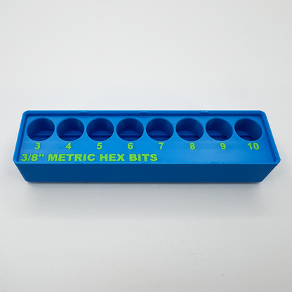 The empty metric hex bit organizer, showing its eight labelled sockets