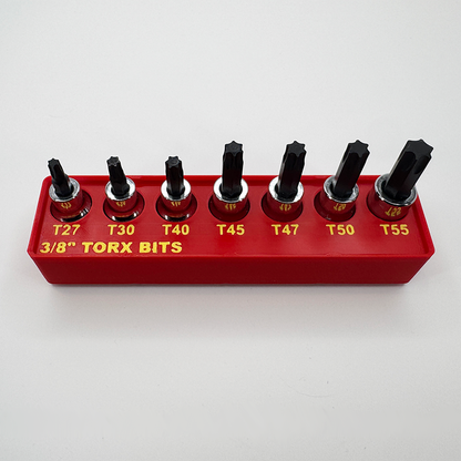 Red Torx bit organizer holding seven bits, T27 through T55 labelled in yellow