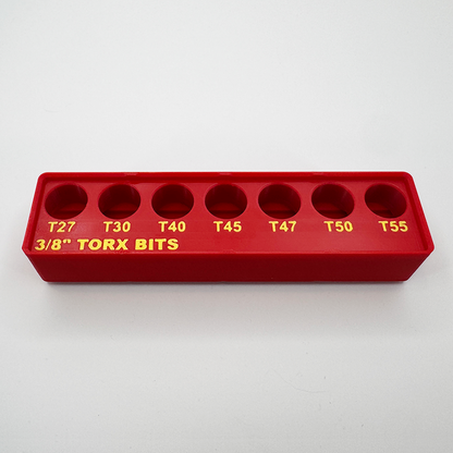 The empty Torx bit organizer, showing its seven labelled sockets