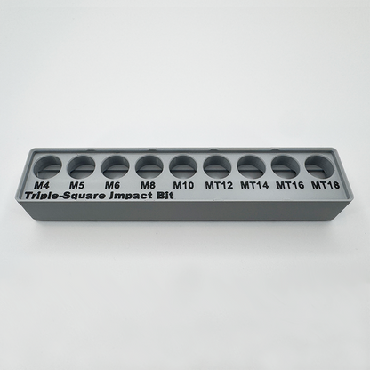 The empty triple-square impact bit organizer, showing its nine labelled sockets